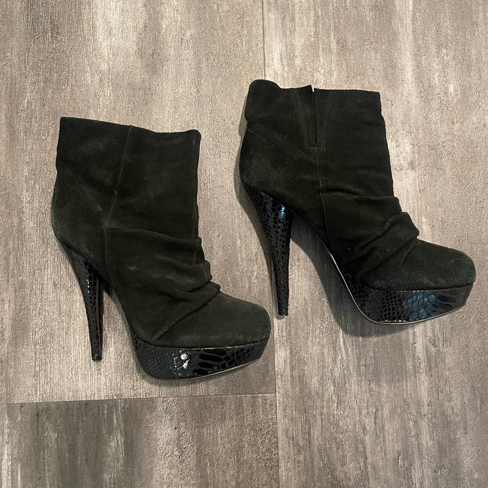 Black suede booties with snakeskin platform heel